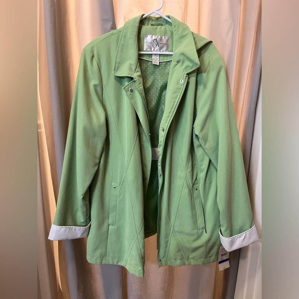 Green women’s rain jacket